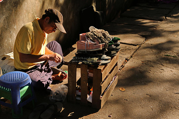 Yangon roadside cobbler
