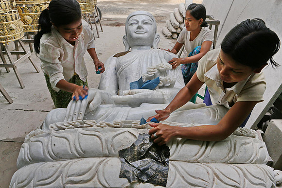 Mandalay statue workshop women polishing marble Buddha statue