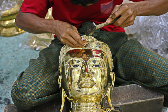Mandalay statue workshop man engraving brass Buddha statue